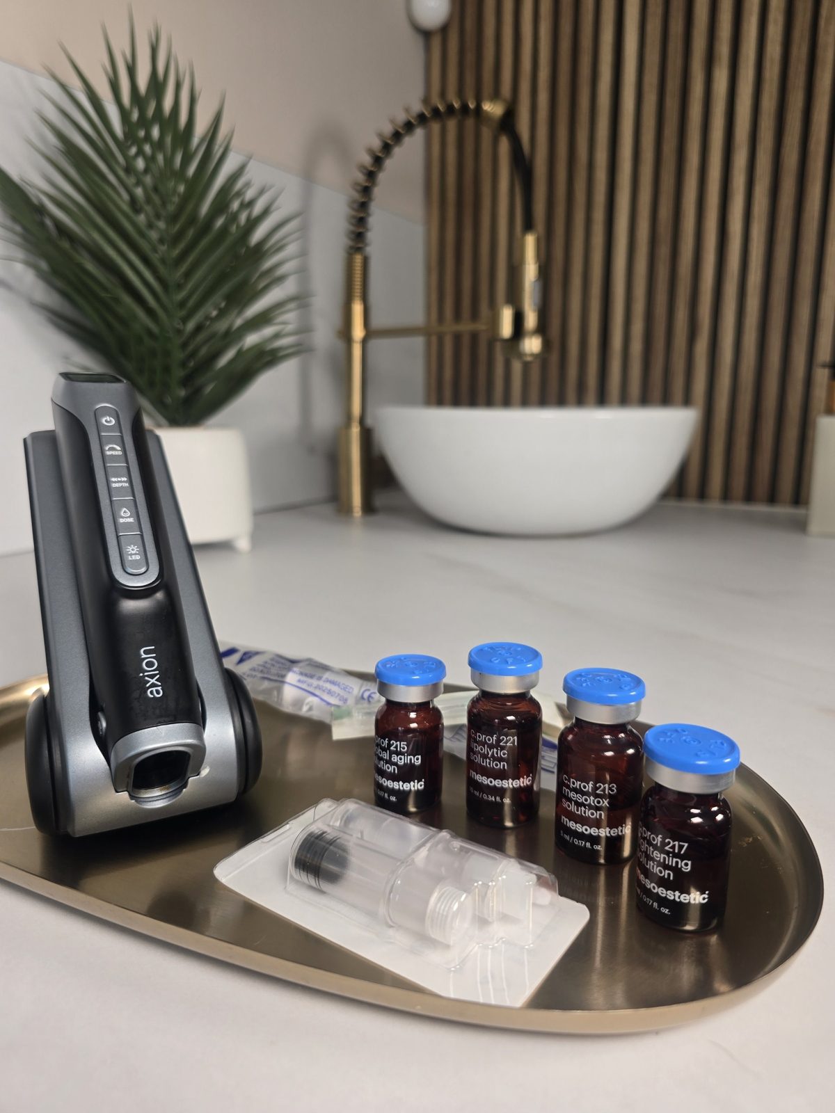 mesoestetic Axion microneedling device with treatment vials