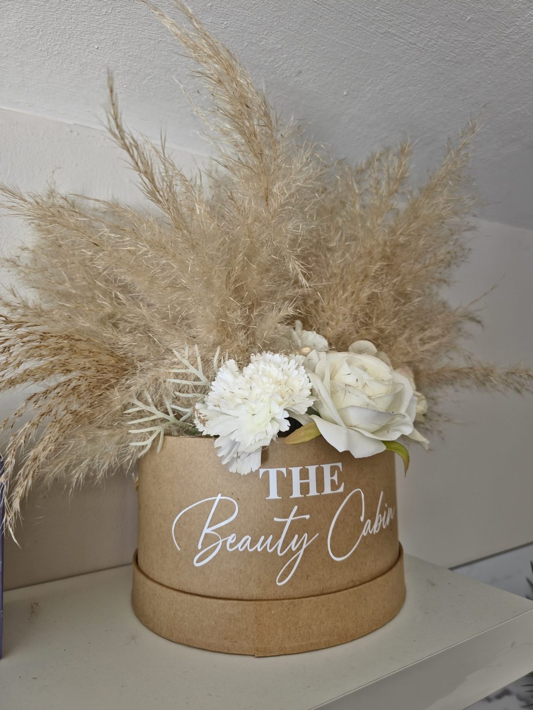 The Beauty Cabin flower box with pampas grass