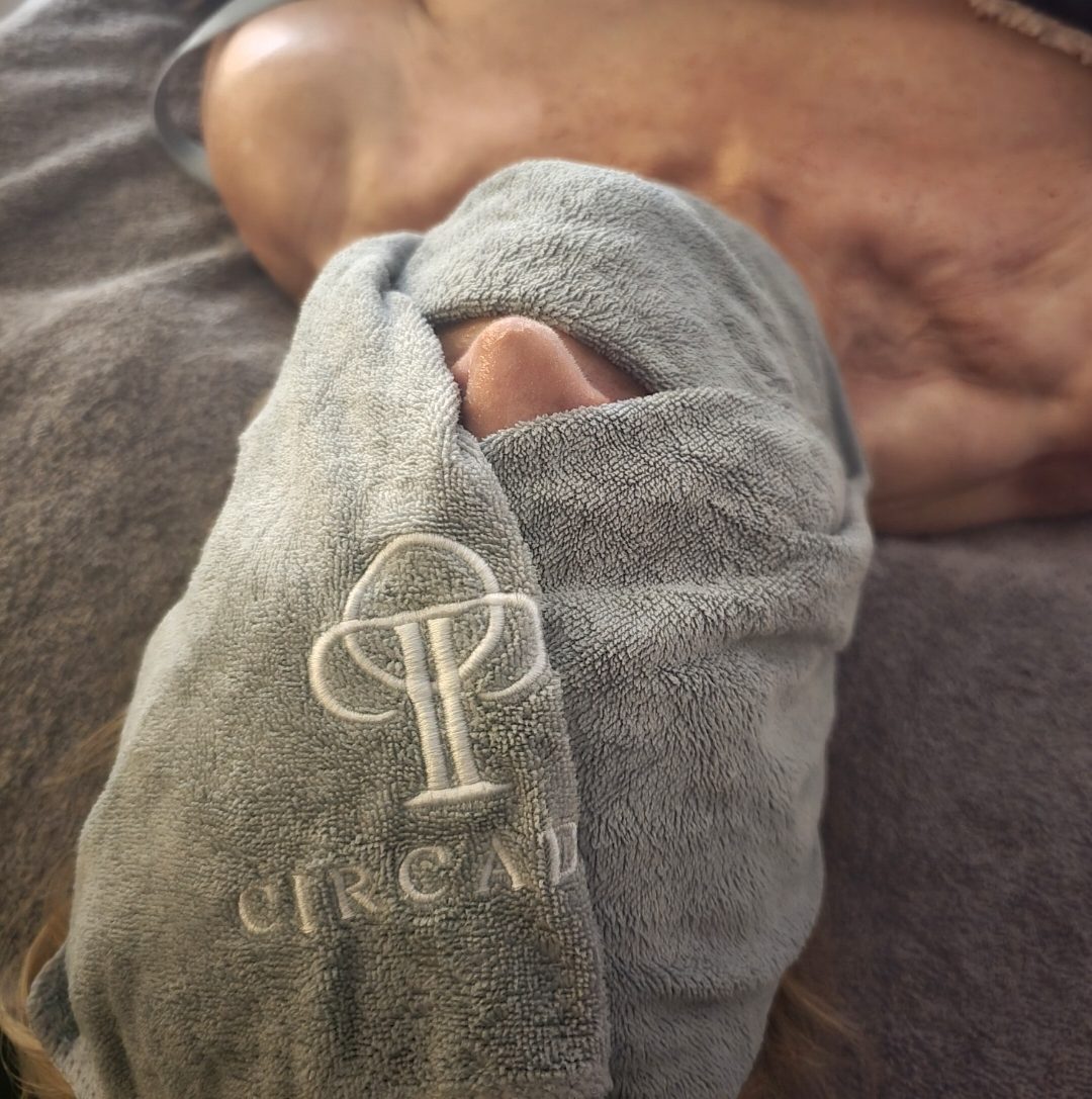 Warm Circadia mitts during a facial